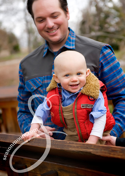 1 year old boy in vest with dad