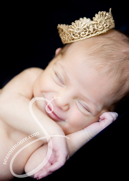 Newborn Smiling in a Crown Raleigh Photographer