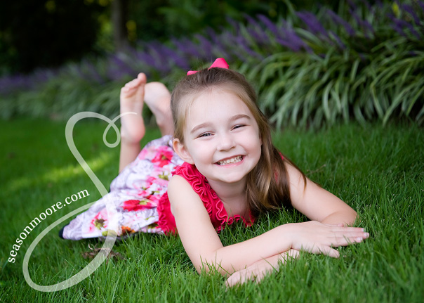 little girl in grass